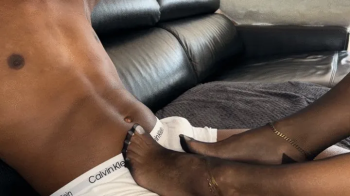 With nylons and toes in white on his BBC side view.webp