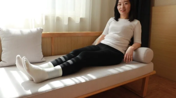 Girl's white cotton socks were tickled after get off work.webp