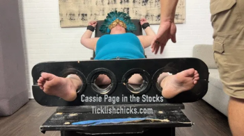 Cassie Page in the Tickling Stocks.webp