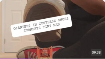 Giantess in Converse Shoes Torments Tiny Man.webp