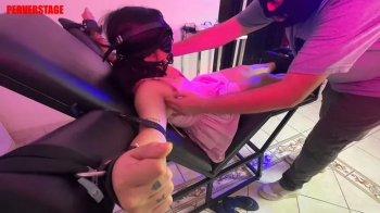 Dolly- barefoot girl in black lace bra and panties, bound with red hemp rope at her wrists and ankles, poses and wiggles.webp