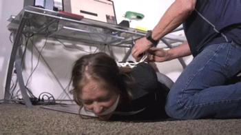 d2507RACHEL-Secretary tied up late in her office.webp