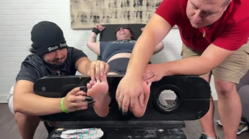 Tickling the TKLNurse in the Stocks Pt 2.webp