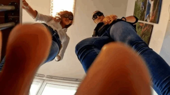 Tiny guy caught in the office by the giantesses.webp