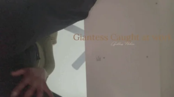 Ebony Giantess caught at work.webp