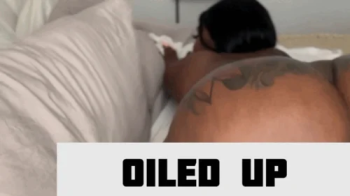 Ebony giantess oiled up.webp
