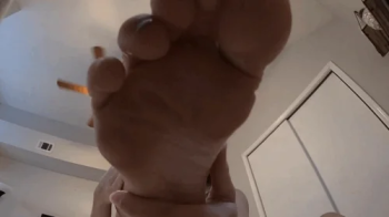 Giantess Stepmom teases shrunken Stepson with feet and asshole.webp