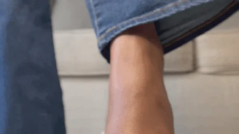 Ebony giantess feet in clear heels.webp