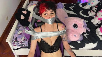 Gamer girl trapped, bound and gagged up to her nose!!!!!.webp