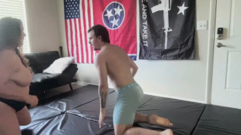 Kristie vs Rex - Topless Wrestling.webp