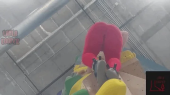 Giantess Layla climbs in red leggings 2.webp