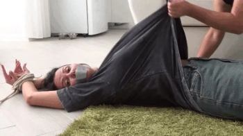 LORY squirms cries and struggles against the tickling Ta.webp