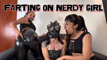 Farting on a Nerdy Girl with a gas mask and humiliation.webp