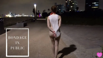 Light bondage and a revealing cutout dress in public.webp
