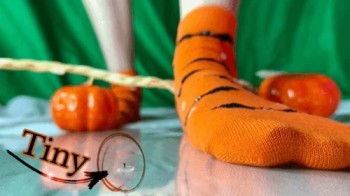 Tiny Sock salesman and Giant feet.webp