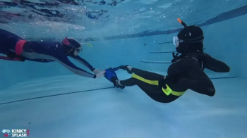 Snorkel Babes Underwater Battle for Fins in Tight Neoprene - MP4.webp