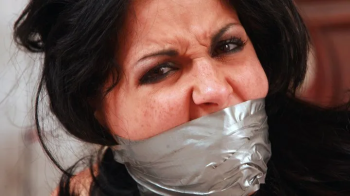 Bitchy Housewife Hannah Massively Gagged with her Well Worn Panties, Tightly Taped Up, Squirming around Her House! RE EN.webp