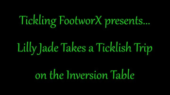 Lilly Jade Takes a Ticklish Trip on the Inversion Table.webp