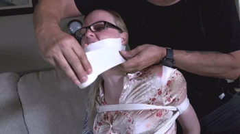 d2508LEIGH-He caught me with rope marks! Now I am bound and gagged again!.webp
