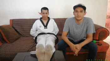 Tough- Karate Fighter Petit Receives Mean Tickling Treatment While Being Ballgagged. His Mate Fabian Shows No Mercy With.webp