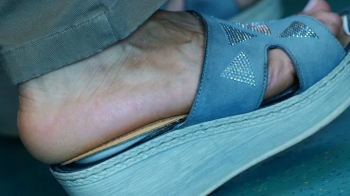Candid sandals and foot fetish watching close-up, hot foot heels, the feet move continuously in an attractive way.webp