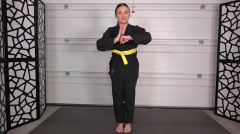JAY EARNS HER ORANGE KARATE BELT.webp