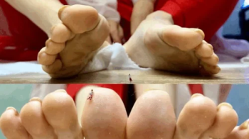 Asian giantess's feet and tiny guy.webp