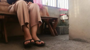Here I am in front of my house rubbing my feet before going to work (7).webp