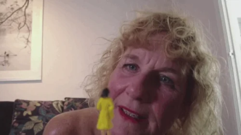 Giantess Molly finds a tiny woman.webp