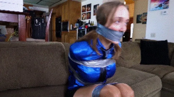 UPSCALED TO 4K at 60FPS! Jade Rose has to ask her friend to tightly tape her up and wraparound tape gag her to fake a ro.webp
