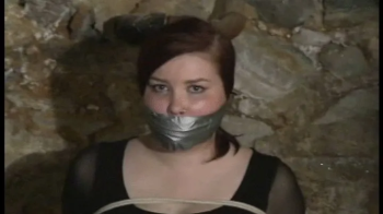 Long Legged College Girl Chair Tied and Gagged in the Basement.webp