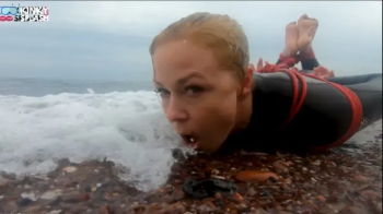 Hogtied in a Wetsuit – Rope Bondage Escape Challenge on the Beach - MP4.webp