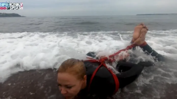 Hogtied in a Wetsuit – Rope Bondage Escape Challenge on the Beach - WMV.webp