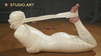 Astrid in a Sleek Microfoam Cocoon Part 2 - Full Body and Head Mummification, Hogtie, and Bare Soles Exposed (FULL HD MP.webp