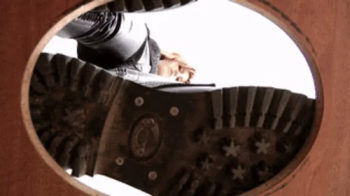 Gothic girl in latex pants and Doc Martens boots above you, fc036x 1080p.webp