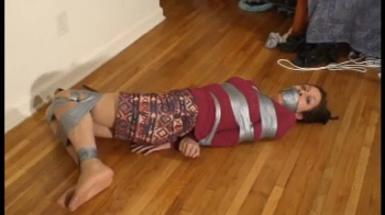 Taped Up and Gagged In Pantyhose Barefoot.webp