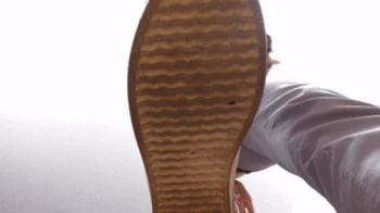 Tall Goddess shows her sneakers soles on camera, fc082h 720p.webp