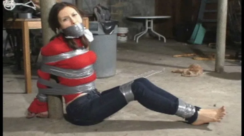 Barefoot and Taped Up and Gagged in the basement.webp