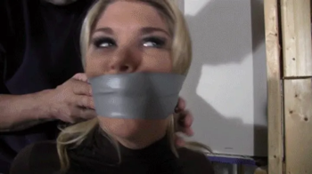 d2511CARISSA-Left gagged and taped to a pole with her big tits out.webp