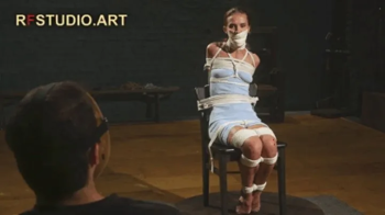Venera - Chair Bondage on the Turntable, Stuffed Mouth with Microfoam Tape Gag (UHD 4K MP4).webp