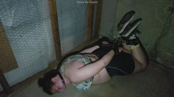 Hogtied, Ballgagged, & Angry on Dirty Basement Floor.webp