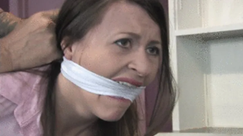 dv2511SERENE-Secretary tied helpless behind the counter and gagged tight.webp