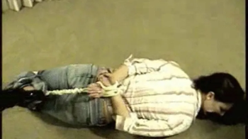 Kobe Lee Hogtied & Gagged on the Floor!.webp