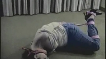 Kobe Lee HogTied & Cleave Gagged In Jeans and Heels On The Floor!.webp