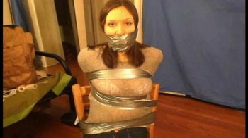 Taped and Worn Socks Off her Feet in Mouth Gagged.webp