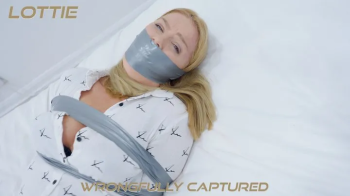 Secretary Lottie's Layered Tape Bondage and Gag Switch Session ( duct tape, hogtie, microfoam, cleave, kinesio, OTN, wra.webp