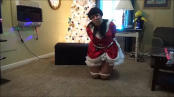 Gina is a little tied up this Chrismas eve.webp