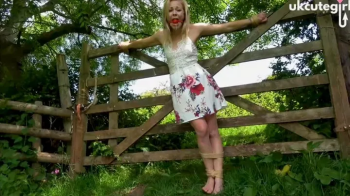Damsel Tied to Gate- Crucifix Bondage & Ballgagged - MP4.webp