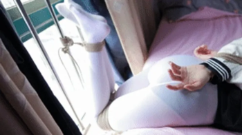 hui11 - The legs of the girl in white stockings are bound with rope.webp