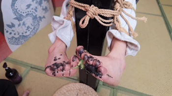xr37-The girl tied to the stool had her feet tickled.webp